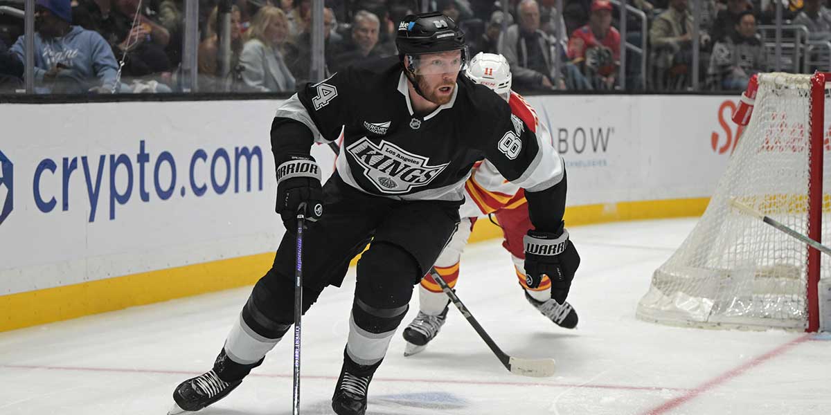 Los Angeles Kings defenseman Vladislav Gavrikov (84) controls the puck during the second period at Crypto.com Arena.