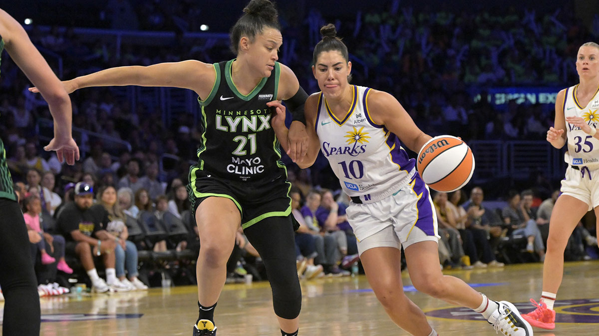 Minnesota Lynx forward Alanna Smith (8) is guarded by Los Angeles Sparks forward Dearica Hamby (5) in the second half at Crypto.com Arena.