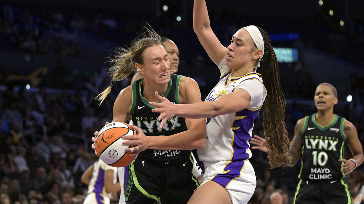 Los Angeles Sparks guard Kelsey Plum (10) drives Minnesota Lynx guard Kayla McBride (21) in the second half at Crypto.com Arena.