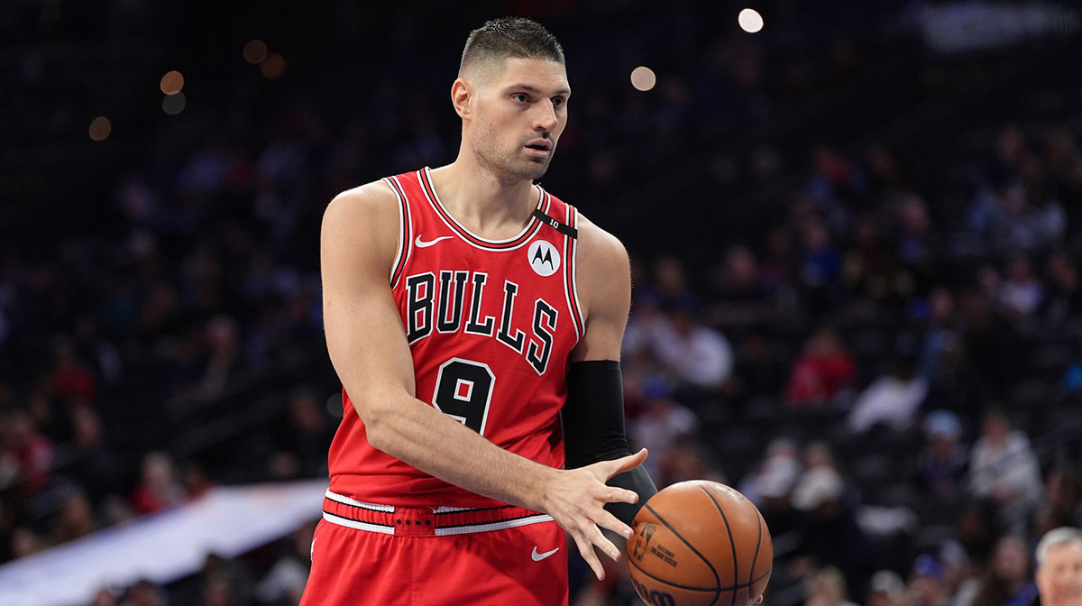 Apr 13, 2025; Philadelphia, Pennsylvania, USA; Chicago Bulls center Nikola Vucevic (9) receives a pass against the Philadelphia 76ers in the first quarter at Wells Fargo Center.