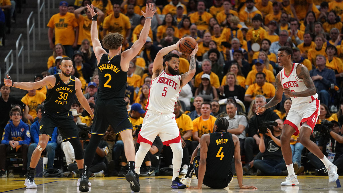 Houston Rockets guard Fred VanVleet (5) holds onto the ball next to Golden State Warriors guard Stephen Curry (30), guard Brandin Podziemski (2) and guard Moses Moody (4) in the third quarter of game six of the first round for the 2025 NBA Playoffs at Chase Center.