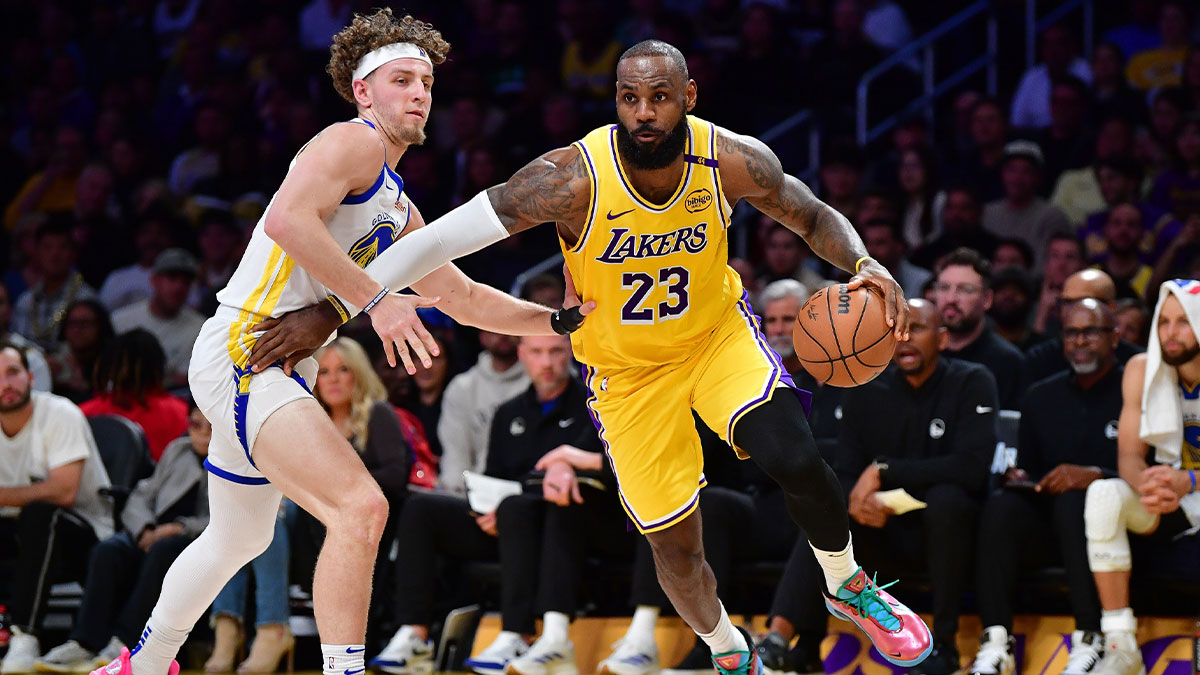 Los Angeles Lakers forward LeBron James (23) moves to the basket against Golden State Warriors guard Brandin Podziemski (2) during the first half at Crypto.com Arena.