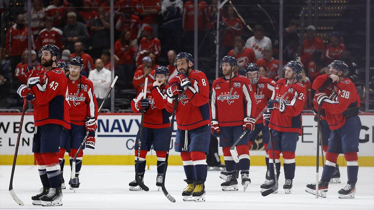 Washington Capitals players stand on the ice after game five of the second round of the 2025 Stanley Cup Playoffs against the Carolina Hurricanes at Capital One Arena.