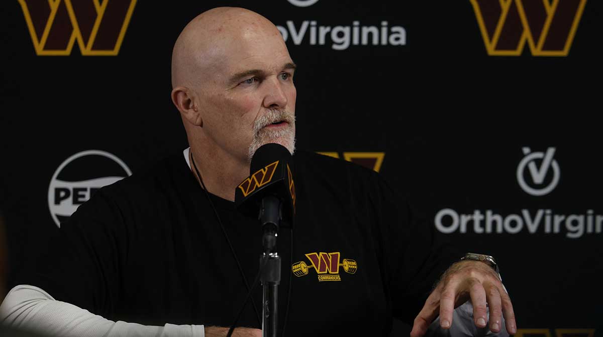 Washington Commanders head coach Dan Quinn speaks with the media prior to day one of minicamp at Commanders Park.