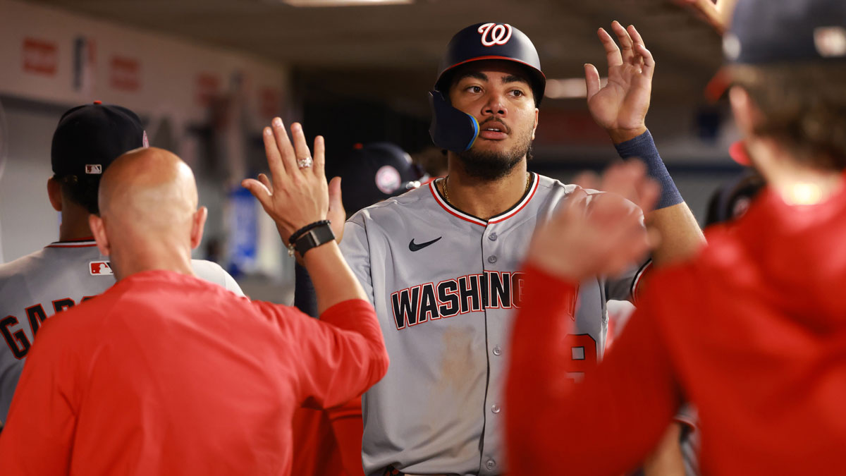 Washington Nationals left fielder James Wood (29) is greeted in the dugout after scoring a run during the eighth inning against the Los Angeles Angels at Angel Stadium. Harper, Soto