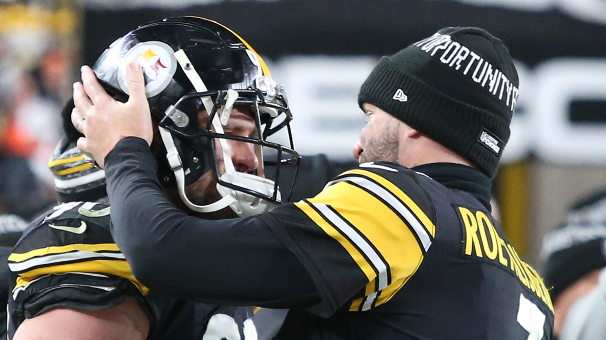 Pittsburgh Steelers quarterback Ben Roethlisberger (7) talks with outside linebacker T.J. Watt (90) on the sidelines against the Cleveland Browns during the fourth quarter at Heinz Field.