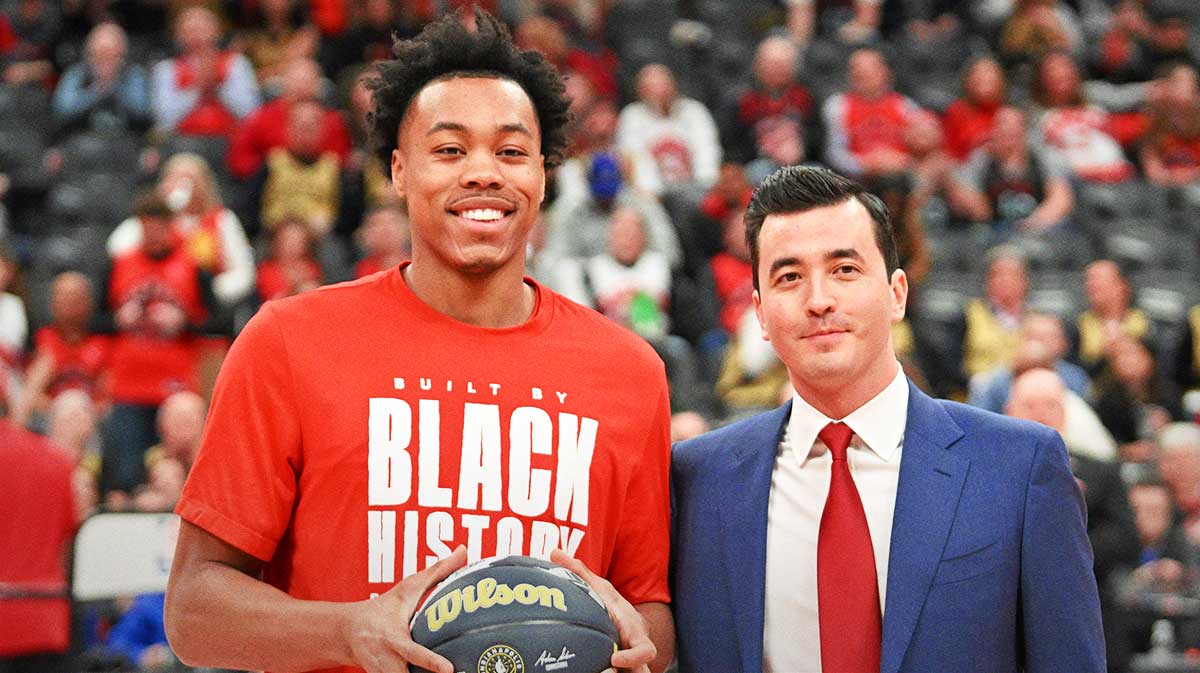 Toronto Raptors forward Scottie Barnes (4) is presented with an official NBA all-star ball by general manager Bobby Webster before play begins against the Indiana Pacers at Scotiabank Arena.
