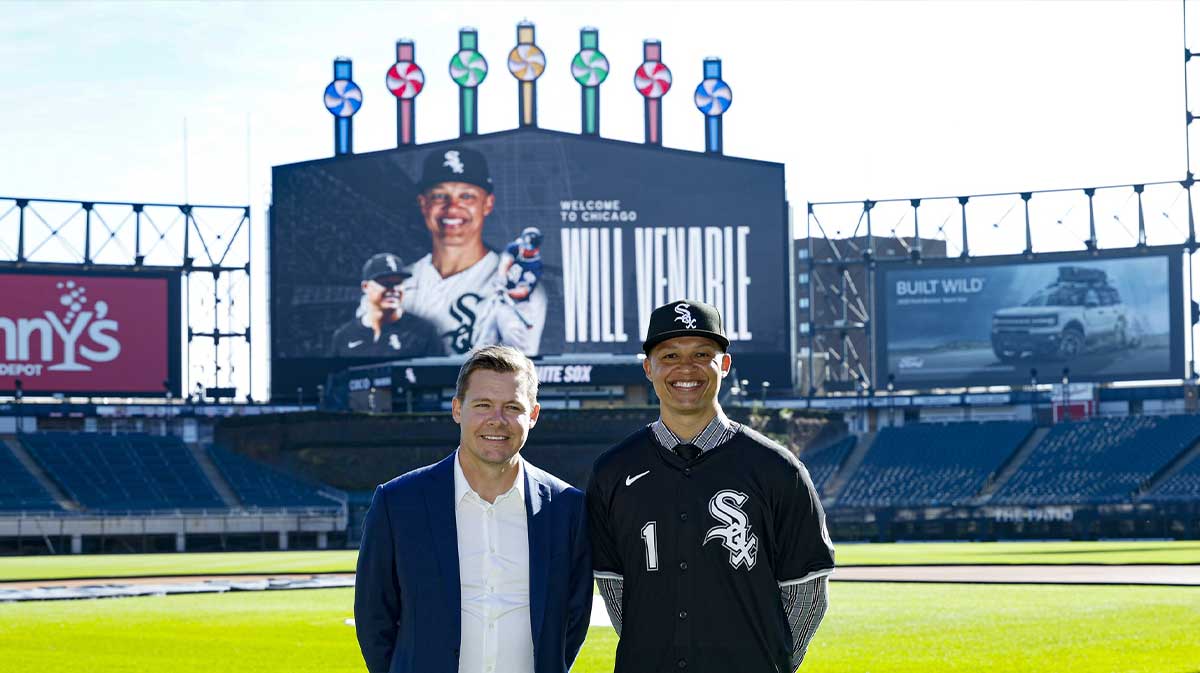 New Chicago White Sox manager Will Venable (R) poses for a photo with general manager Chris Getz (L) at Guaranteed Rate Field.