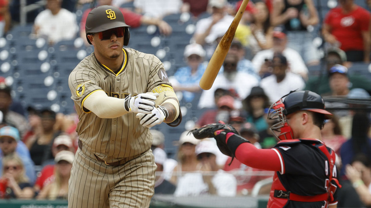 San Diego Padres third baseman Manny Machado (13) tosses his bat after drawing a walk against the Washington Nationals during the second inning at Nationals Park.