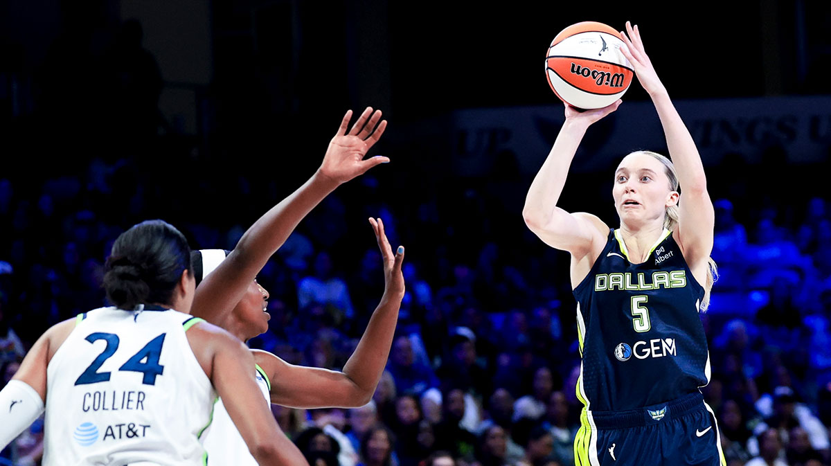 Dallas Wings guard Paige Bueckers (5) shoots over Minnesota Lynx forward Napheesa Collier (24) during the second half at College Park Center.