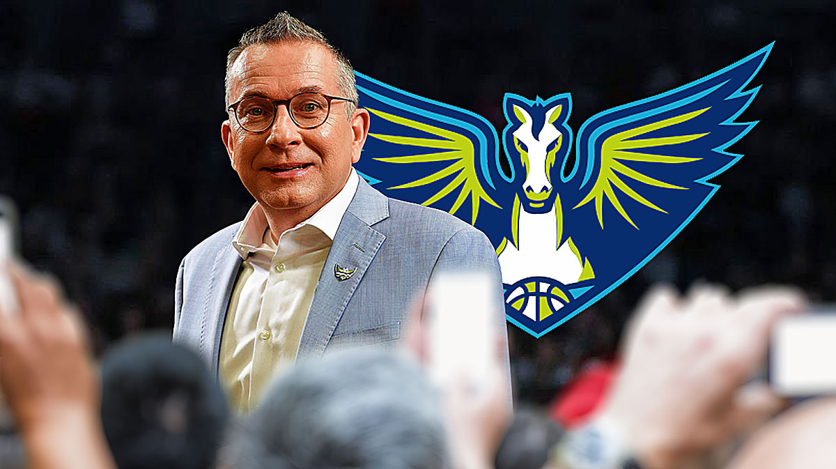 Wings GM Curt Miller in Wings gear on left. Dallas Wings logo on right.