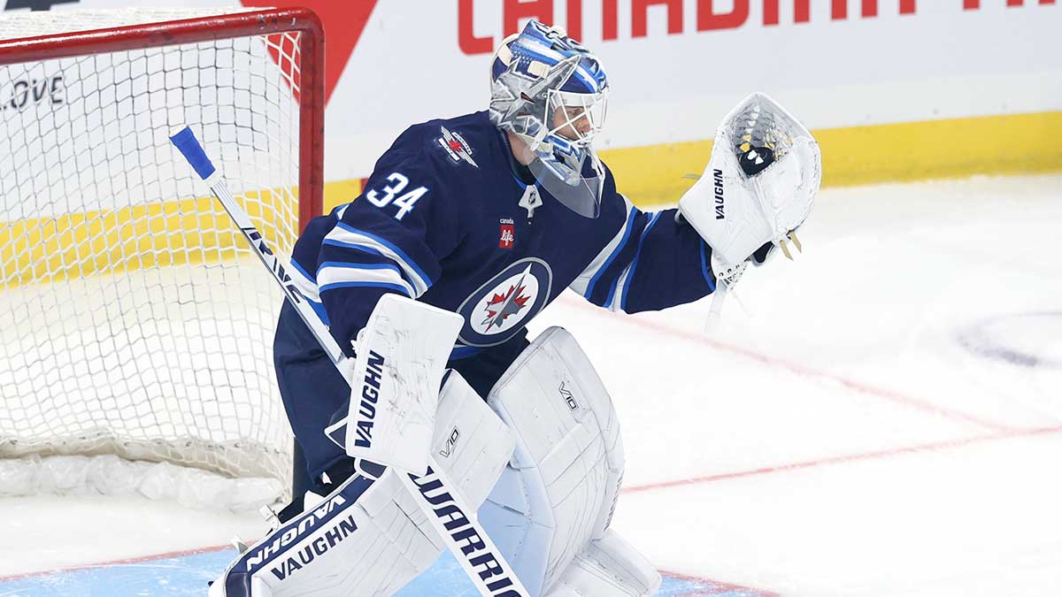 Winnipeg Jets goaltender Kaapo Kahkonen (34) warms up before a preseason game against the Minnesota Wild at Canada Life Centre.