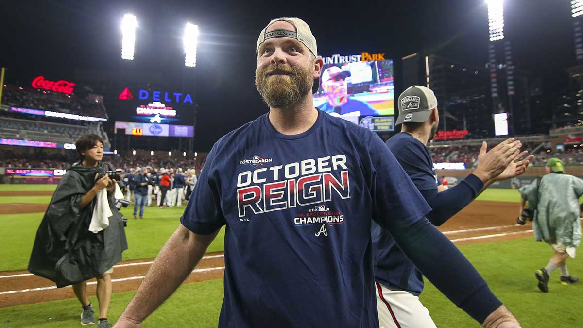 Atlanta Braves catcher Brian McCann (16) celebrates after clinching the NL East division after defeating the San Francisco Giants at SunTrust Park. Mandatory Credit: Brett Davis-Imagn Images