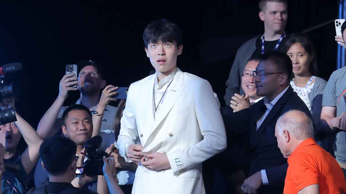 Yang Hansen walks to the stage after being selected as the 16th pick by the Memphis Grizzlies in the first round of the 2025 NBA Draft at Barclays Center.