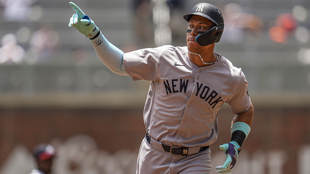 New York Yankees right fielder Aaron Judge (99) runs after hitting a home run against the Atlanta Braves during the first inning at Truist Park.