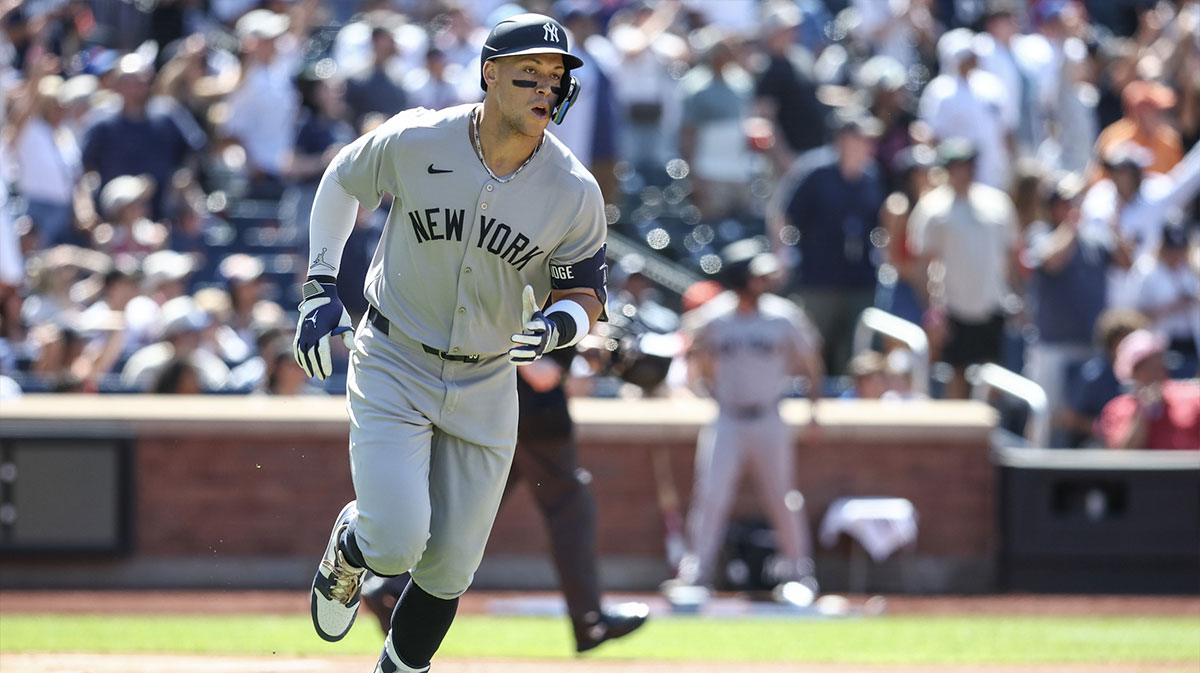 New York Yankees right fielder Aaron Judge (99) hits a solo home run in the first inning against the New York Mets at Citi Field.