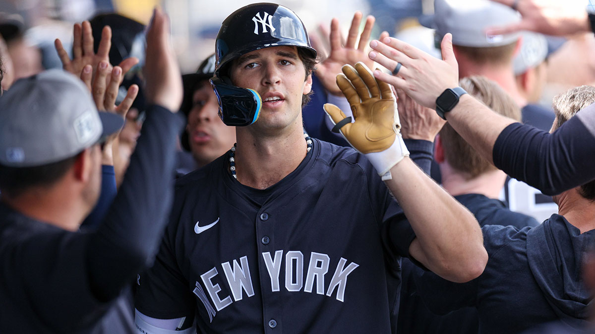 New York Yankees outfielder Spencer Jones (78) celebrates after hitting a three-run home run against the Philadelphia Phillies in the third inning during spring training at BayCare Ballpark.