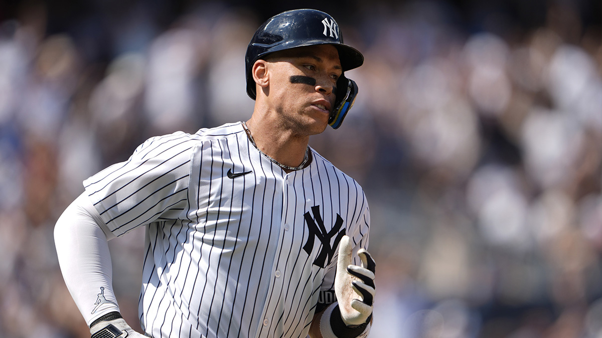 New York Yankees right fielder Aaron Judge (99) rounds the bases after hitting a two run home run for his 350th home run against the Chicago Cubs during the ninth inning at Yankee Stadium.