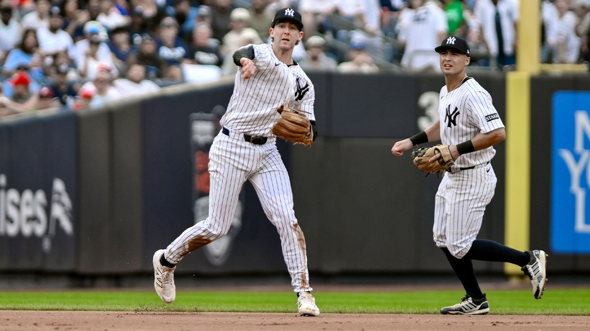 New York Yankees third baseman Ryan McMahon (19) throws to first base for an out during the fifth inning against the Philadelphia Phillies at Yankee Stadium. Mandatory Credit: John Jones-Imagn Images