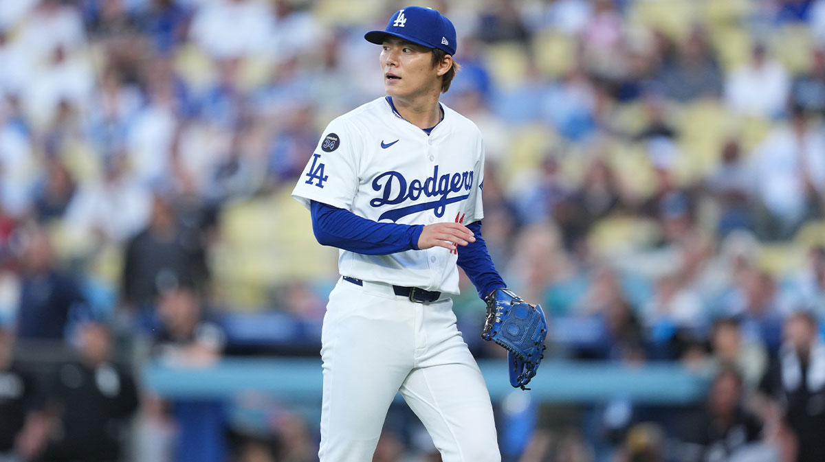Los Angeles Dodgers starting pitcher Yoshinobu Yamamoto (18) walks back to the dugout following the first inning against the Chicago White Sox at Dodger Stadium.