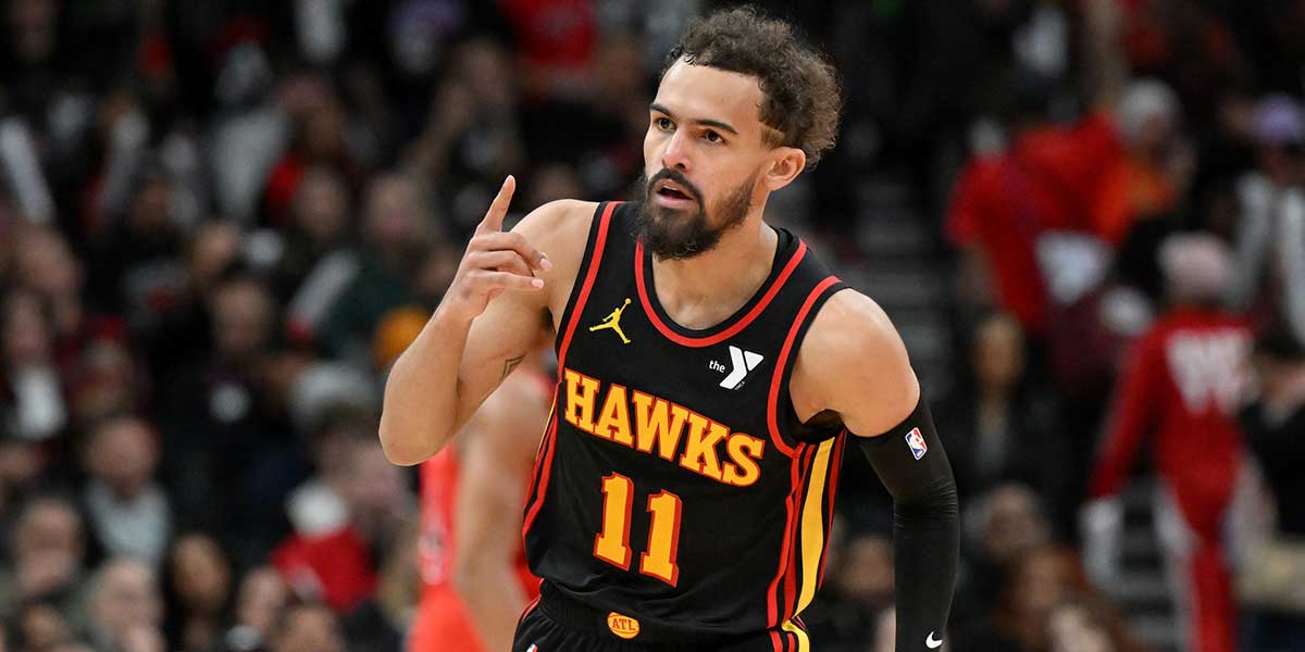 Atlanta Hawks guard Trae Young (34) reacts after making a three-point basket against the Toronto Raptors in the second half at Scotiabank Arena.