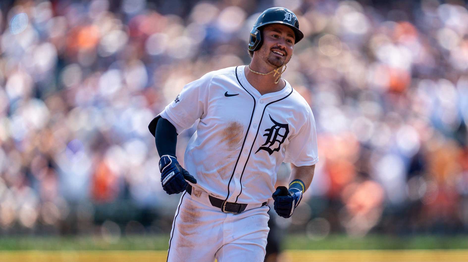 Detroit Tigers Zach McKinstry smiles as he runs home after hitting a home run against the Twins at Comerica Par
