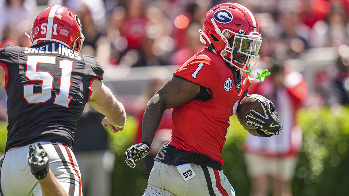 Georgia Bulldogs wide receiver Zachariah Branch (1) runs with the ball during the Georgia Spring game at Sanford Stadium.