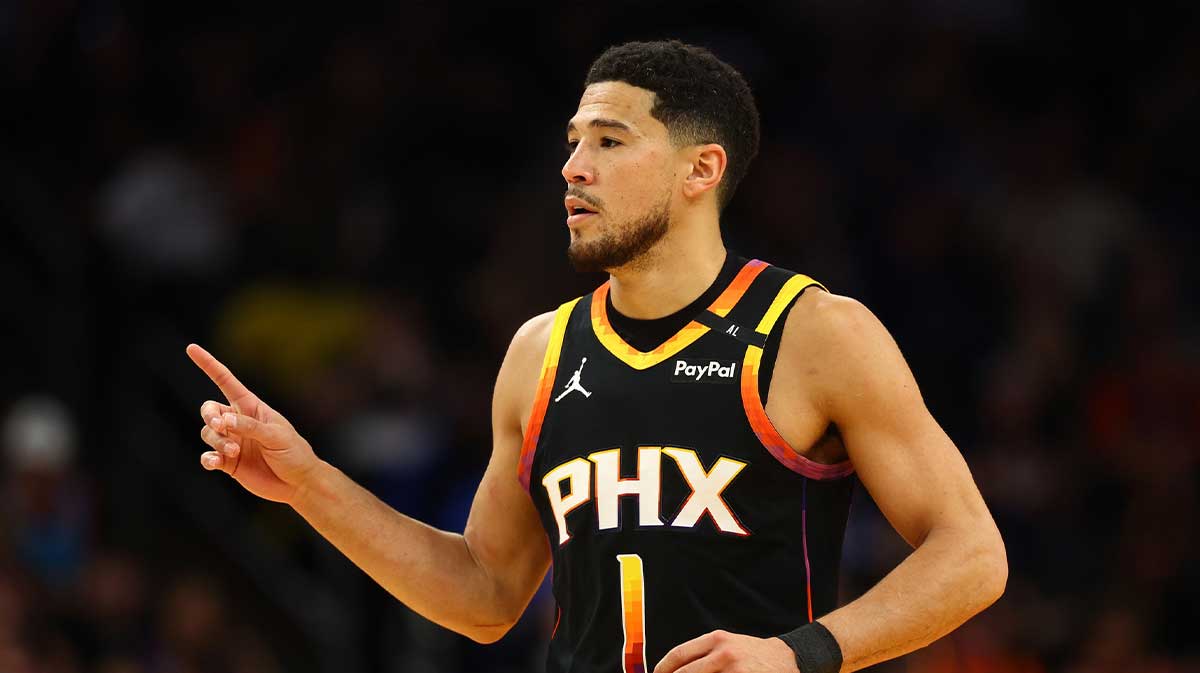 Phoenix Suns guard Devin Booker (1) reacts after a play against the Oklahoma City Thunder during the first half at Footprint Center.