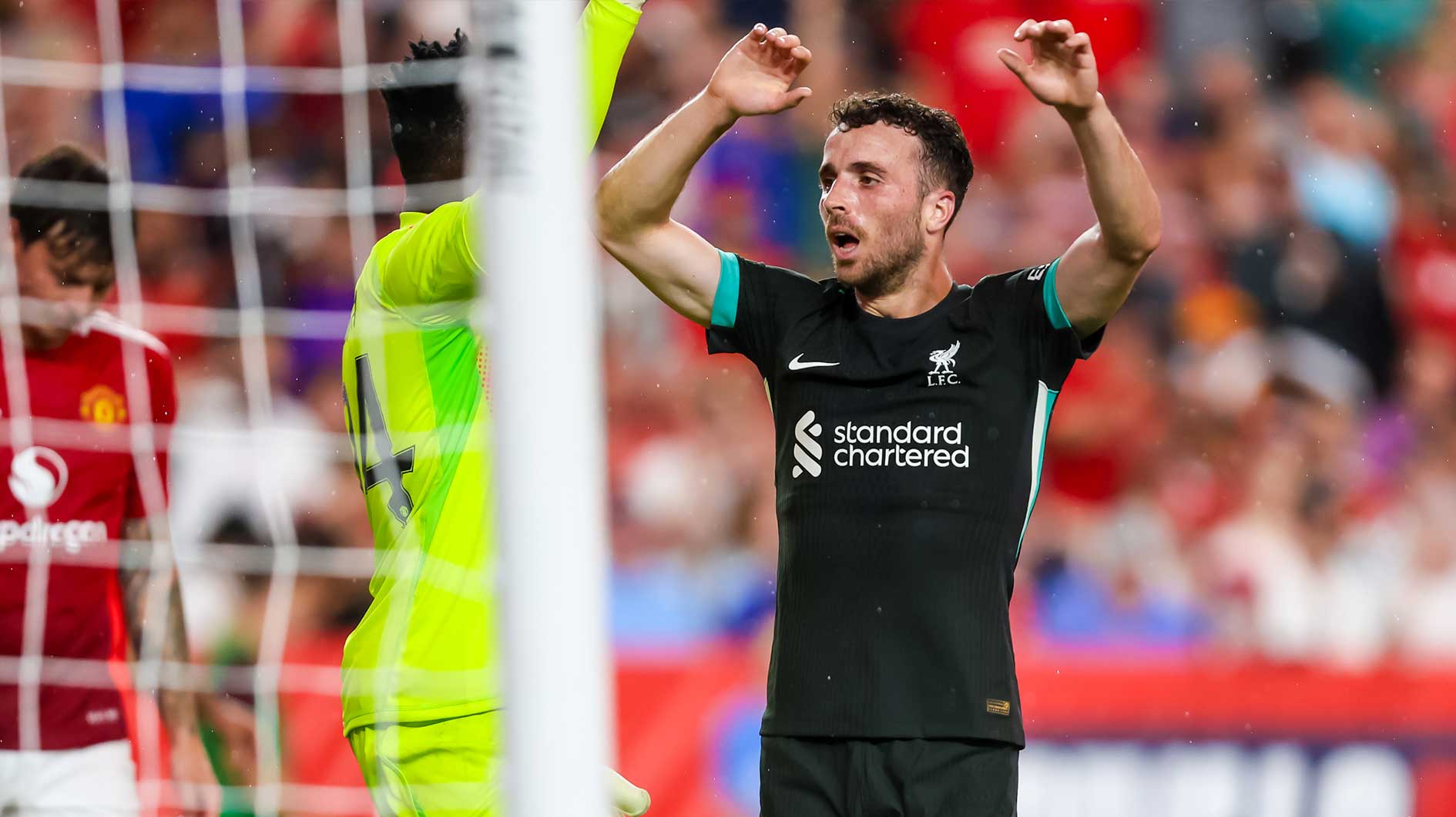 Liverpool forward Diogo Jota (20) celebrates a goal against Manchester United at Williams-Brice Stadium.