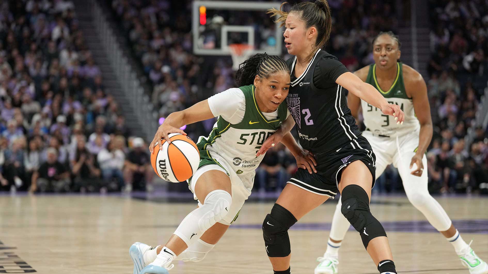 Seattle Storm guard Zia Cooke (left) dribbles against Golden State Valkyries guard Kaitlyn Chen (2) during the fourth quarter at Chase Center.