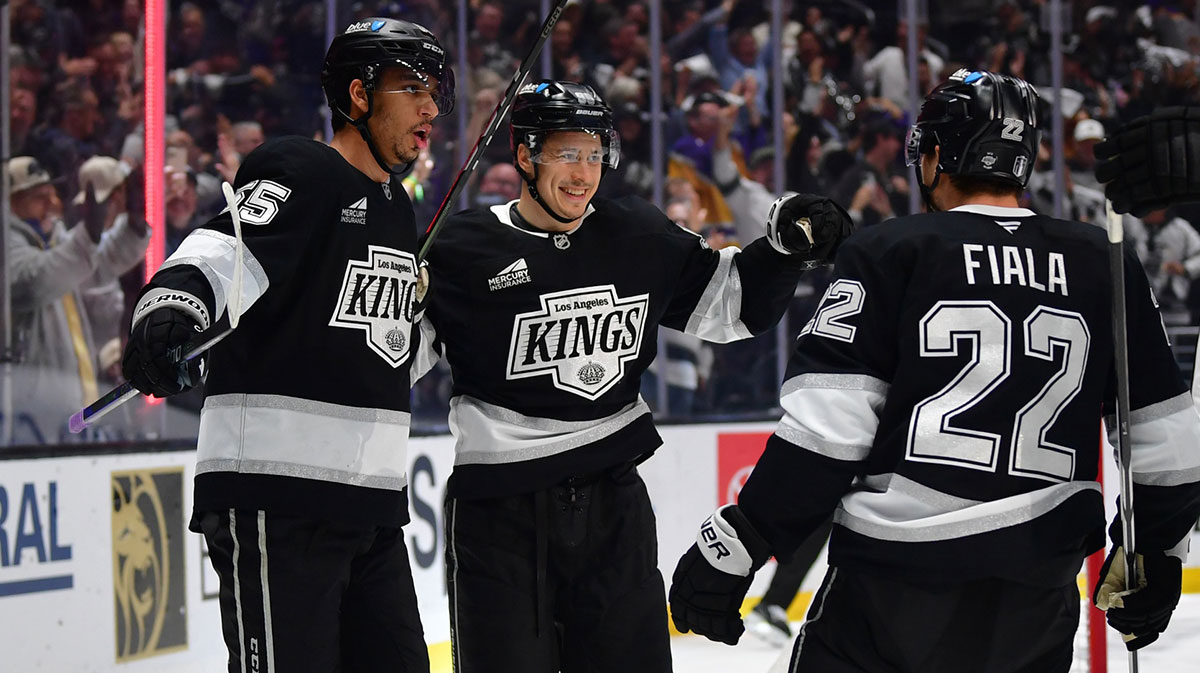 Los Angeles Kings left wing Andrei Kuzmenko (96) celebrates his power play goal scored against the against the Edmonton Oilers with right wing Quinton Byfield (55) and left wing Kevin Fiala (22) during the second period in game five of the first round of the 2025 Stanley Cup Playoffs at Crypto.com Arena.