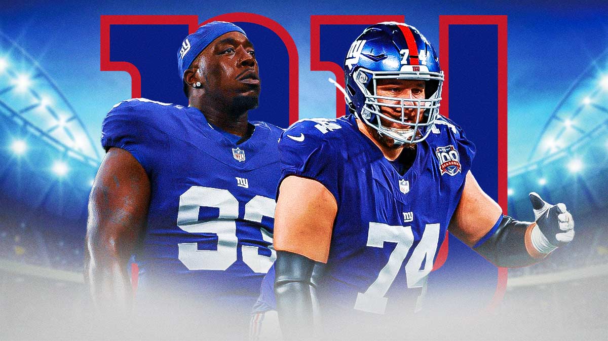 Giants OG Greg Van Roten and Giants DE Rakeem Nunez-Roches both looking down. New York Giants logo in background