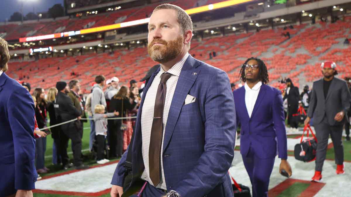 Georgia Bulldogs defensive coordinator Glenn Schumann walks into Sanford Stadium before a game against the Georgia Tech Yellow Jackets.