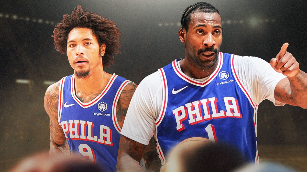 Kelly Oubre and Andre Drummond in front of the 76ers arena.