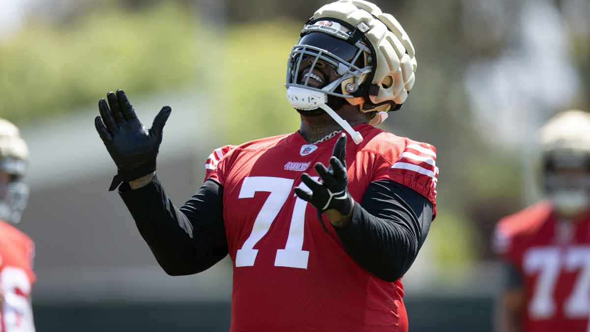 San Francisco 49ers offensive tackle Trent Williams (71) reacts to a blocking drill during an OTA at Levi's Stadium.