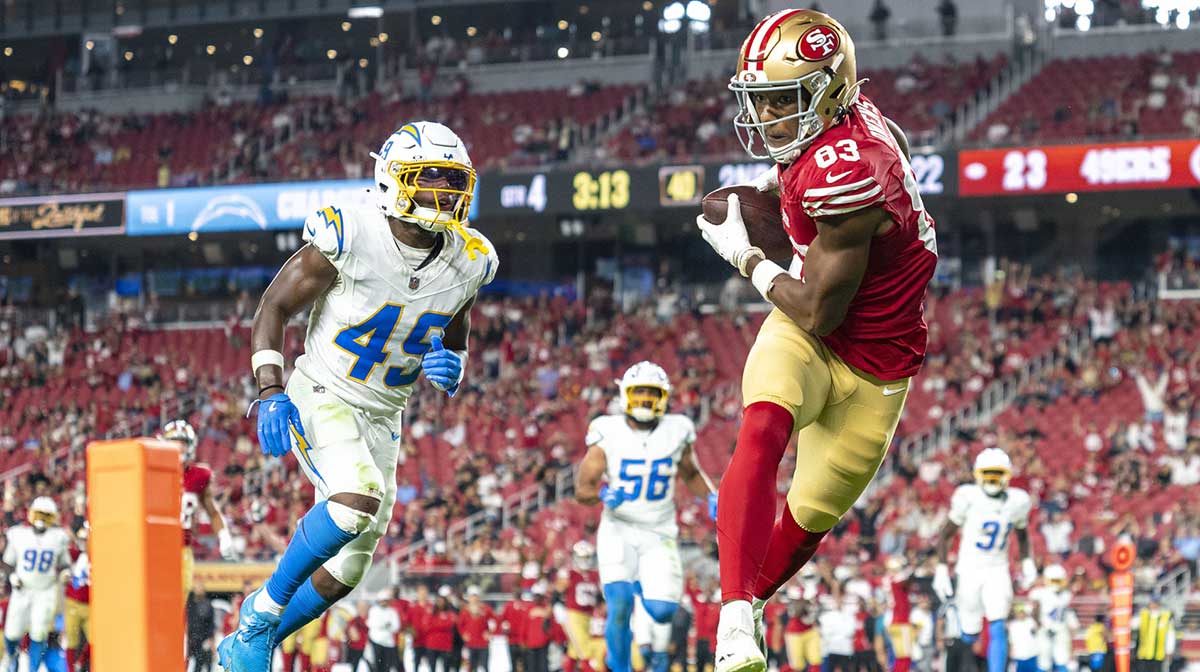 San Francisco 49ers wide receiver Terique Owens (83) scores a touchdown against Los Angeles Chargers cornerback Myles Purchase (49) during the fourth quarter at Levi's Stadium.