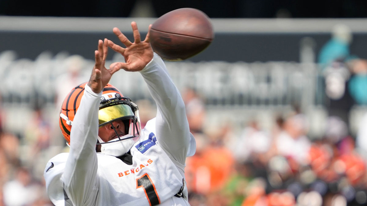 Bengals continue training camp Monday July 28, 2025. Players and coaches ran drills outside on the practice lawn until rain moved the camp to the Bengals' inside practice facility. Bengals Ja'Marr Chase (1) at camp.