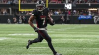 Atlanta Falcons running back Bijan Robinson (7) runs for a touchdown against the Carolina Panthers during the second half at Mercedes-Benz Stadium.