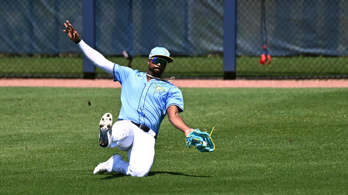 Tampa Bays Rays left fielder Eloy Jimenez (74) catches a line drive in the third inning against the Washington Nationals during spring training at Charlotte Sports Park. 