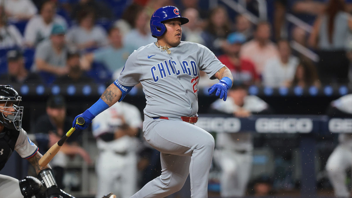 Chicago Cubs designated hitter Moises Ballesteros (25) hits an RBI single against the Miami Marlins during the sixth inning at loanDepot Park.