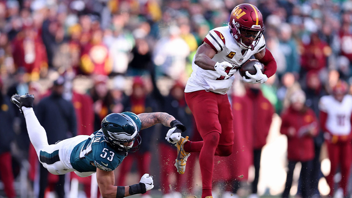 Washington Commanders wide receiver Terry McLaurin (17) evades the tackle of Philadelphia Eagles linebacker Zack Baun (53) during the first half in the NFC Championship game at Lincoln Financial Field.