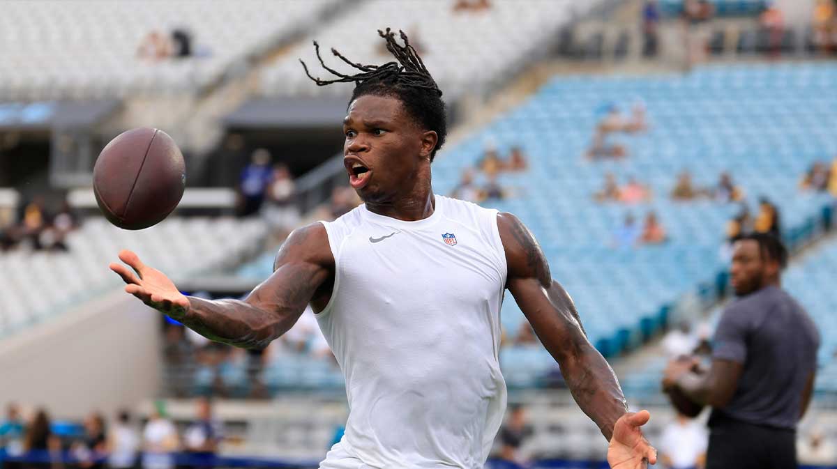 Jacksonville Jaguars wide receiver Travis Hunter (12) can’t haul in a reception before an NFL preseason matchup at EverBank Stadium, Saturday, Aug. 9, 2025 in Jacksonville, Fla. [Corey Perrine/Florida Times-Union]