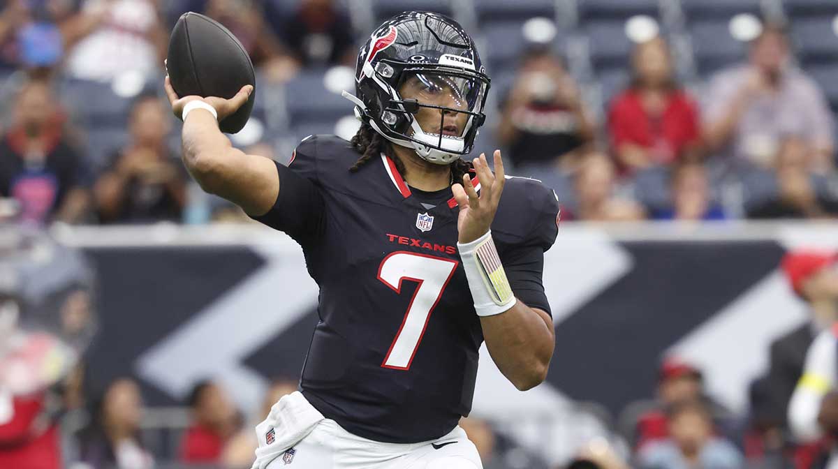 Houston Texans quarterback C.J. Stroud (7) attempts a pass during the first quarter against the Carolina Panthers at NRG Stadium.