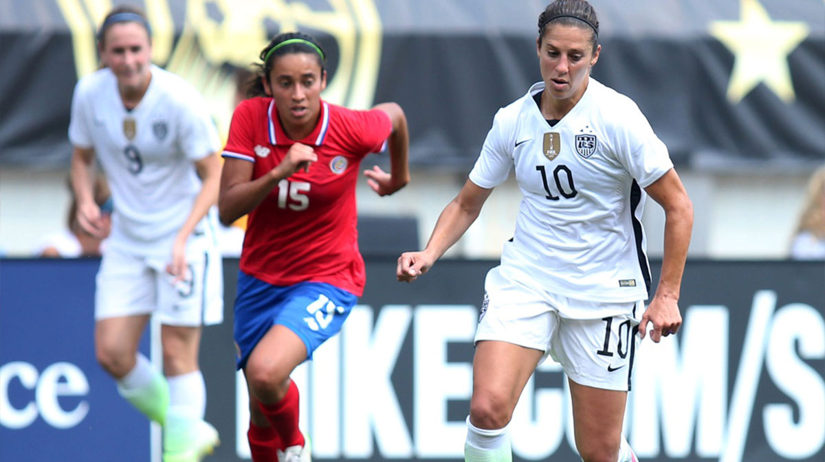 United States midfielder Carli Lloyd (10) dribbles the ball upfield as Costa Rica midfielder Cristin Granados (15) chases during the second half at Heinz Field. The United States won 8-0.