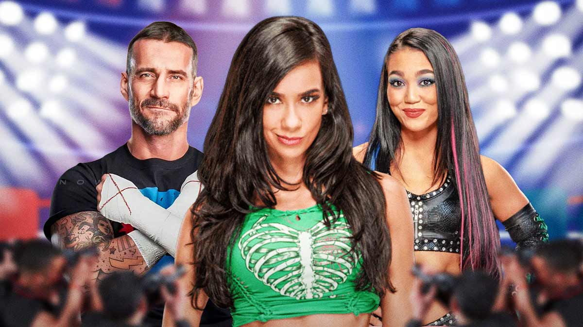 WWE legend AJ Lee in between CM Punk and her 'daughter' Roxanne Perez.