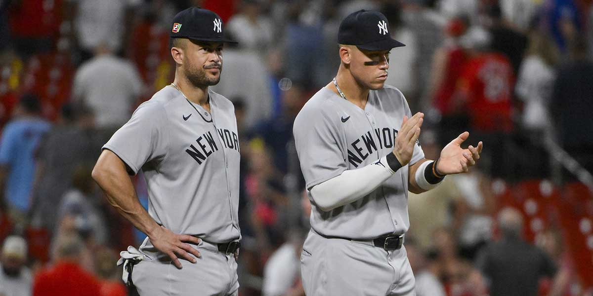 New York Yankees designated hitter Aaron Judge (99 and Giancarlo Stanton (27) celebrate after the Yankees defeated the St. Louis Cardinals at Busch Stadium.
