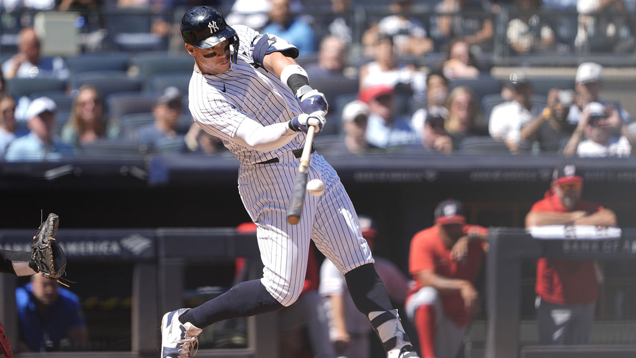 New York Yankees designated hitter Aaron Judge (99) hits a two run home run against the Washington Nationals during the third inning at Yankee Stadium.