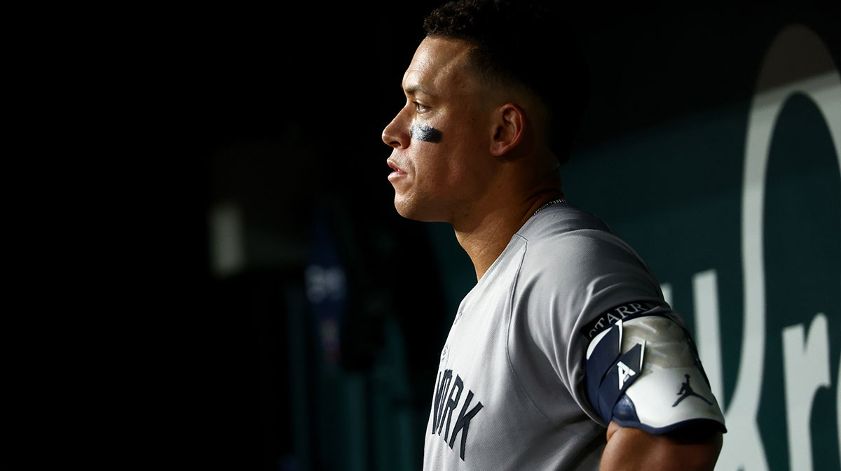 New York Yankees designated hitter Aaron Judge (99) reacts in the dugout during the game against the Texas Rangers at Globe Life Field.