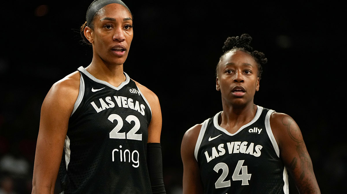 Las Vegas Aces center A'ja Wilson (22) and guard Jewell Loyd (24) look on during the first half of a WNBA basketball game against the Connecticut Sun at Michelob Ultra Arena.