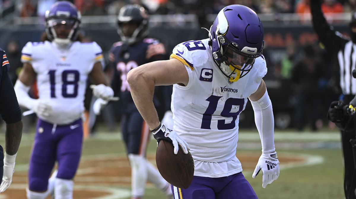 Minnesota Vikings wide receiver Adam Thielen (19) celebrates his touchdown against the Chicago Bears during the first half at Soldier Field.